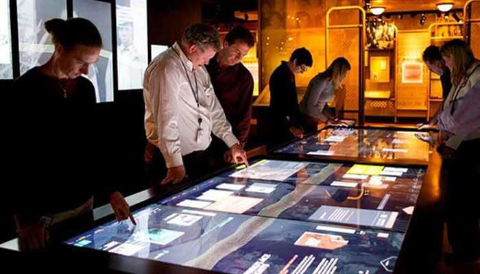 Interactive surfaces and displays at the booth exhibition stand design